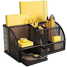 two black mesh desk accessories with yellow accents on them, including pens and pencils