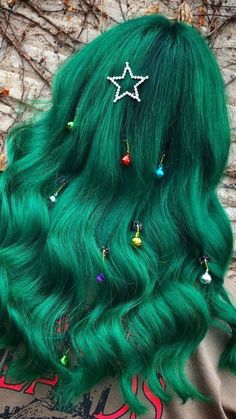 Lively green waves create a vibrant base for this festive hairstyle, adorned with colorful Christmas balls in red, blue, gold, and silver. A prominent star-shaped accessory adds the perfect touch of holiday cheer! Click the pin for more festive ideas and follow us for more holiday hairstyle inspiration! #ChristmasHair #FestiveWaves #HolidayHairstyles #ColorfulAccessories #ChristmasTreeStyle Christmas Hair Dye Ideas, Christmas Color Hair, Christmas Tree Hairstyles, Christmas Hair Dye, Red And Green Hair, Christmas Hair Color, Pastel Rainbow Hair, Christmas Tree Hair, Festive Hair