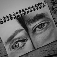 a pencil drawing of two people's eyes