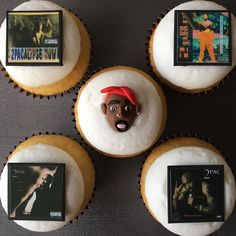 three cupcakes with white frosting and various cd's on the top