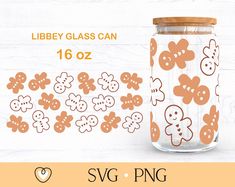 a glass jar with ginger cookies on it next to a wooden sticker that says liberty glass can 16oz