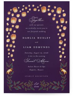 a purple and gold wedding card with candles in the middle, surrounded by greenery