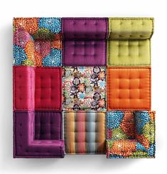 an image of a colorful patchwork pattern with text that reads, the mah long sofa was originally created by hans hofer in 1971