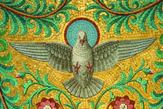 a close up of a bird on a mosaic