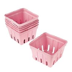 two pink plastic containers sitting next to each other