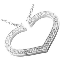 18k White Gold Diamond Large C Heart Pendant Necklace by Cartier. With 30 round brilliant cut diamonds VVS1 clarity, E color total weight approx. .60ct *Includes Cartier Service Certificate Details: Pendant: 20mm x 27mm Length: 17.25" Weight: 9.2 grams Stamped Hallmarks: Cartier 750 ONXXXX *Free Shipping within the United States* YOUR PRICE: $8,000 Ti795hedd Necklace Cartier, C Heart, C Necklace, Cartier Diamond, White Gold Pendant Necklace, Gold C, Gold Pendant Necklace, Heart Pendant Necklace, Round Brilliant Cut Diamond