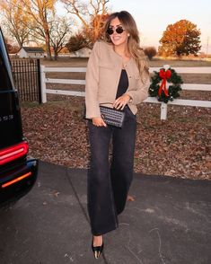 How cute is this casual chic outfit for autumn? Create the look by pairing street-style barrel jeans with a simple black bodysuit, fashionable heels, and a classy beige cropped blazer jacket. Accessorize the look with an elegant clutch, a cute belt, and cool sunglasses for an effortless vibe. Great for the office, dinner, date nights, going out, and more! Casual Chic Outfit | Cropped Blazer Outfit | Fall Outfit Inspo | Dinner Outfits | Emily Ann Gemma Barrel Jeans, Cropped Blazer Jacket, Blazer Outfit