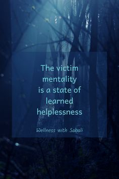 the victim mentality is a state of learned helplessness quote on blue forest background