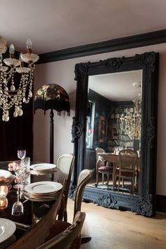 the dining room table is set for dinner