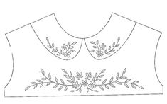 an embroidered top with flowers and leaves on it