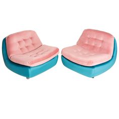 two pink and blue chairs sitting next to each other