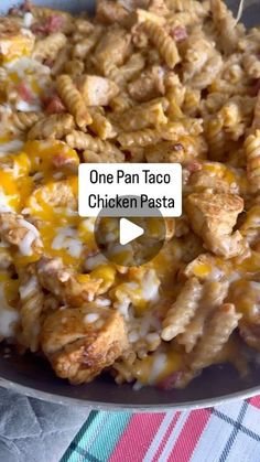 one pan taco chicken pasta in a skillet on a table with a red and white checkered cloth