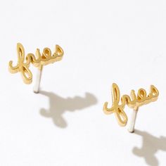 Feeling salty? You can't buy happiness, but you can buy French fries - and that's pretty close. Taters gonna tate! These Fries Stud Earrings are 14k gold plated brass and are perfect for any potato fan. The sterling silver post is great for any spud. Bless your lucky starch! Script measures 8 x 6mm.Custom cut in the handwritten cursive script of our own boss babe, Larissa, this is a 100% original design and 100% badass on a sterling silver friction push back post with sterling silver butterfly e Mn State Fair, Cursive Design, Feeling Salty, Cursive Script, Silver Butterfly, French Fries, Boss Babe, Original Design, Potato