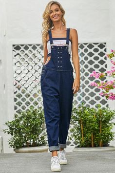 Grommet Detail Dark Blue Denim Overall Blue Denim Jumpsuit With Pockets, Indigo Denim Top With Pockets, Dark Wash Non-stretch Denim Jumpsuit, Non-stretch Dark Wash Denim Jumpsuit, Casual Indigo Denim Jumpsuit, Blue Denim Top With Pockets, High Waist Washed Blue Denim Jumpsuit, Non-stretch High Rise Denim Jumpsuit, Blue Non-stretch Casual Denim Top