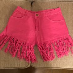 Pink Fringe Shorts That Fit Daisy Duke Style. Cute And Stylish With Front And Back Pockets! #Katchinglooks High Waist Fringe Shorts For Summer, Summer Cotton Jean Shorts With Fringe, Summer Fringe Shorts, Trendy Cotton Fringe Shorts, Casual Beach Bottoms With Fringe, Casual Fringe Bottoms For Beach, Casual Fringe Jean Shorts For Summer, Casual High-waisted Shorts For Festivals, Summer Festival Shorts With Fringe