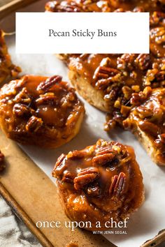 pecan sticky buns on a baking sheet with text overlay that reads, once upon a chef