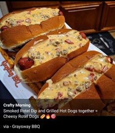 three hotdogs with cheese and toppings are on a white platter