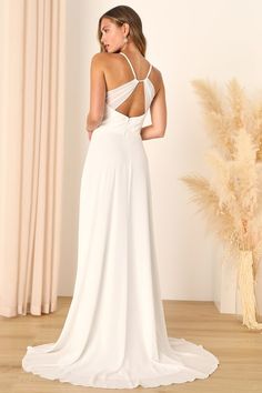 Your big day will be special all on its own, but the Lulus Romantic Inspiration White Sleeveless Faux-Wrap Maxi Dress will make sure it's extra stylish! Airy woven chiffon shapes this elegant dress that features slender straps, a surplice neckline, and a gathered bodice with sheer adjustable panels that create a flirty open-back cutout. A high, banded waist tops an overlapping skirt that lends a faux-wrap effect as it cascades down to a sweeping maxi hem with a dramatic train the back. Hidden ba Surplice Dress, White Chiffon, White Sleeveless, Lulu Fashion, Chiffon Gown, Maxi Wrap Dress, Cutout Dress, Elegant Dress, Dress Backs