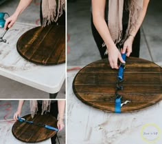 the woman is making a wooden table with blue tape