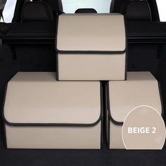 four seats in the back of a car with beige leather upholstered and black stitching