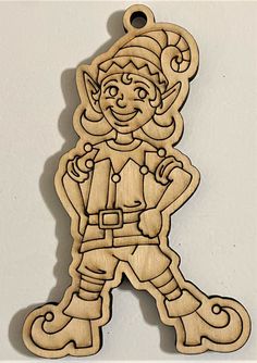 a wooden ornament depicting an elf