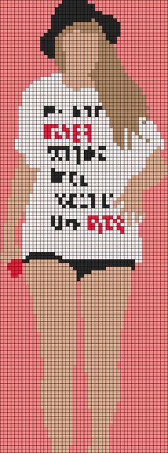 a cross - stitch pattern of a woman holding a sign that says love is in the air