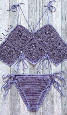 two purple crocheted bikinisuits with ties on the bottom and one in the middle