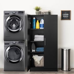 a washer and dryer in a laundry room with the door open to show what's inside