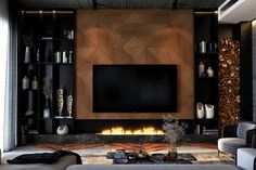 a modern living room with fireplace and entertainment center