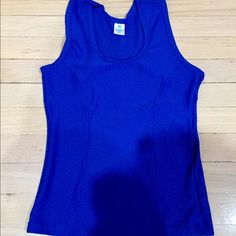 Brand New Jersey Material Sleeveless Top In A Royal Blue. Has Mesh Details In Black And It’s A V-Neck Cut And It’s Stretchy. Really Cute And New Comes In A Clear Bag. Will Ship Right Away. Blue Scoop Neck Sporty Tank Top, Sporty Blue Scoop Neck Tank Top, Blue Scoop Neck Tank Top, Blue Cami Tank Top, Blue Stretch Sleeveless Vest, Fitted Blue Tank Top, Blue Scoop Neck Vest Top, Blue Stretch Workout Vest, Blue Summer Workout Vest