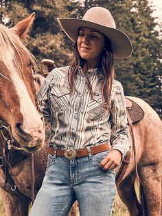 MADE TO WEAR EVERYWHERE A cowgirl can never have too many collared shirts for competition and daily life. Our Women's Wrangler Retro® All-Occasion Western Snap Dress Shirt is crafted a lightweight cotton and recycled materials blend that will keep you comfortable in everything you do. It comes with pointed yokes, pearl snaps, two chest pockets with the signature "W" stitching, and a contrast print at the cuffs. Collared Shirts, Destructed Jeans, Western Women, Country Shirts, Loose Fit Jeans, Short Shirts, Western Outfits, Denim Shop, Women's Tops