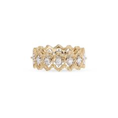 a yellow gold ring with white diamonds