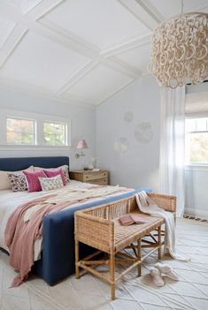 a bedroom with white walls and carpeted flooring