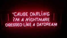 a neon sign that says cause driving i'm a nightmare dressed like a daydream