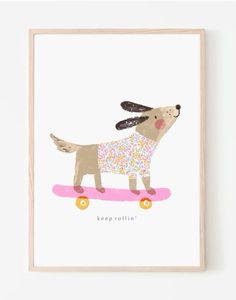 a dog on a skateboard with sprinkles is shown in a wooden frame