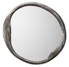 a round mirror with curved metal frame