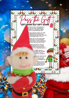 a stuffed toy elf next to a poster