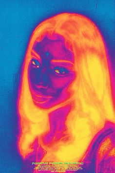 a woman's face is shown in red and yellow infrared images on a blue background