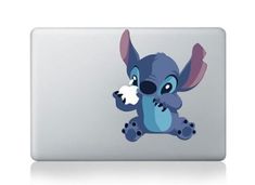 the laptop has an image of stitch on it