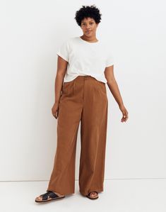 Made of a drapey TENCEL lyocell and linen blend, these wide-leg pants have sailor-inspired button tabs at the waist.Full-length inseam that hits right above the ground when worn with heels.12 3/4" rise, 23" leg opening, 30" inseam. Petite inseam: 27 1/2"; tall inseam: 33".48% TENCEL lyocell/33% cotton/19% linen.Do Well: TENCEL lyocell fibers are derived from sustainable wood sources in a closed-loop process; for each piece made at the Fair Trade Certified factory, we contribute to a Community De Best Work Pants, Linen Pants Outfit, Black Linen Pants, Buy Sweaters, Pants Details, Fall Fits, Slip Skirt, Madewell Denim, Black Linen