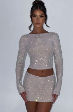 Glow all night in the Tani set. Cut from a sparkly rhinestone mesh that hugs every curve, this long sleeve nude top is cropped with a high neck. Match with the Tani skirt, sleek waves and heels for party season. Heels For Party, Sleek Waves, Homecoming Dresses Corset, Nude Tops, Stretch Mesh Fabric, Looks Party, Maxi Dress Sale, Popular Dresses, Sparkle Dress