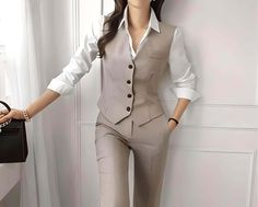 Introducing the Chic Business Suit Jacket Vest and Straight Pants Suit Set For Women, the ultimate choice for sophisticated and professional attire. This impeccably tailored suit set is designed to exude elegance and empower women in the workplace.🌟 The jacket features a sleek and structured silhouette, With its modern design, it effortlessly adds a touch of style to any ensemble. 🌟 The vest is a versatile addition to this set, allowing you to customize your look according to your preference and the occasion. Whether worn alone or as part of the full suit, it adds a layer of refinement and sophistication.🌟 The straight pants are tailored to perfection, offering a flattering fit that accentuates your curves while maintaining a professional appearance. The fabric ensures comfort throughou 3 Piece Suit Women, Maternity Nightwear, Plus Size Robes, Korean Fashion Women, Professional Attire, Pants Suit, 3 Piece Suits, Business Suit, T Shirt Vest