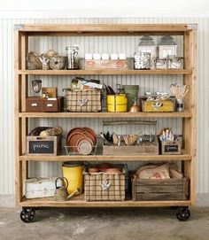 a wooden shelf filled with lots of different types of containers and boxes on it's sides