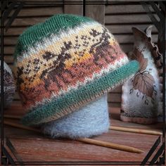 Hello!  I would like ofer you really soft and not ordinary hat. It's double but not havy, absolutely.  At the top is a whole painting of cute dear walking one after the other. I knitted this hat for people who like this animal and want to see a little piece near wildlife. Thanks to the variety of colours, it will be easy to combine this hat with the rest of the outfit. 5% moher - for cosiest softness  15% wool  - for warmth. 80% premium akrilik - for amazing bright colours which  don't blend tog Knitted Fall Bonnet, Comfortable Knitted Patterns For Winter, Comfortable Knitted Cap, Comfortable Knitted Cap Hat, Whimsical Beanie For Fall, Whimsical Fall Beanie Hat, Knitted Cap For Fall, Comfortable Knitted Hat For Outdoor, Bohemian Outdoor Knitted Hats