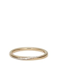 a gold ring with white diamonds on the inside, and a thin band around it