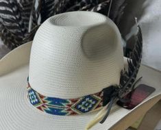 Adjustable Brimmed Hats With Bead Caps, Traditional Adjustable Hats With Bead Caps, Traditional Beaded Adjustable Hat, Casual Beaded Hat Bands For Festivals, Traditional Adjustable Hat Bands For Summer, Adjustable Short Brim Beaded Hat, Traditional White Hat For Rodeo, Traditional White Rodeo Hat, Casual Beaded Hats For Festivals