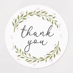 a thank sticker with the words thank you in black ink on a white background