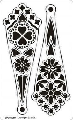 the stencil is designed to look like an ornate vase with flowers and hearts on it