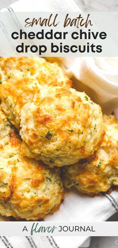 small batch cheddar chive drop biscuits on a white plate with text overlay