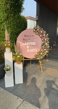 there is a sign that says karushi & rauh on it with flowers